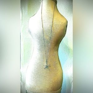 Dainty high polished starfish pendant new without tags 925 sliver